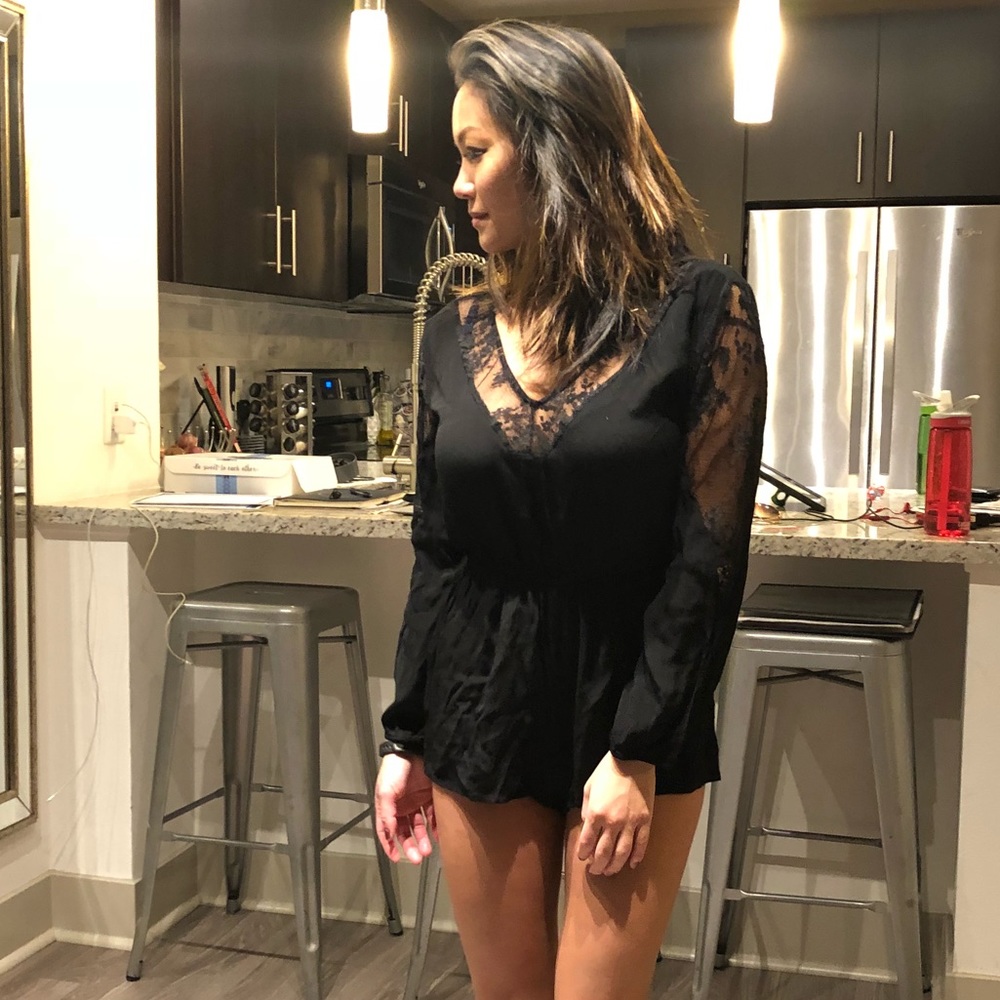 Long sleeve black romper with lace detail